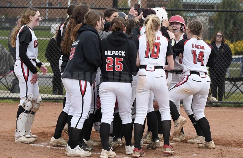 Chardon Softball team celebrates after a Sarah Sutton home run.